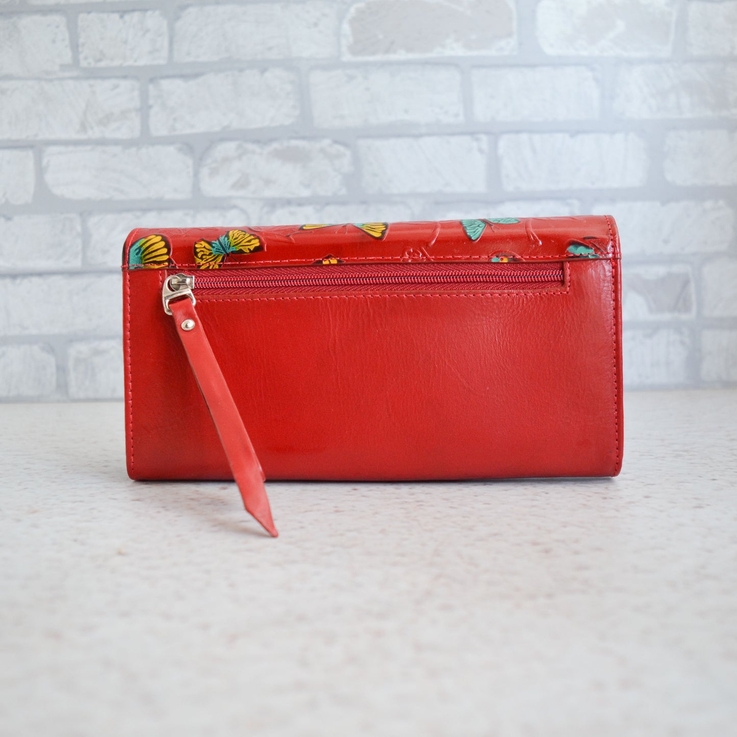 Billetera Flora roja de cuero para mujer