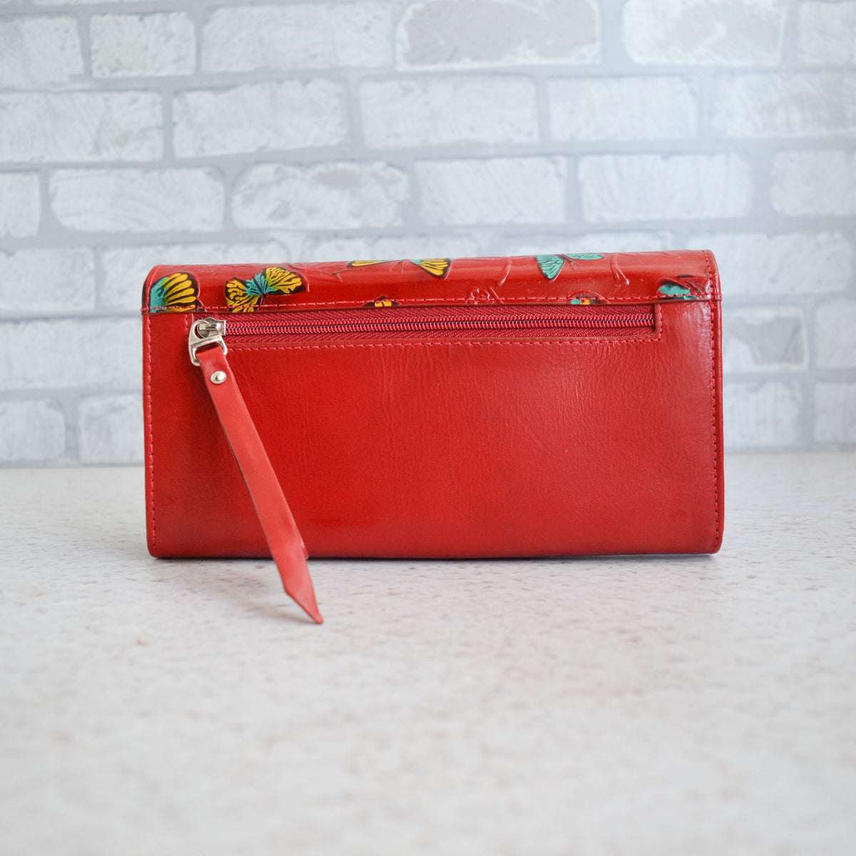 Billetera Flora roja de cuero para mujer