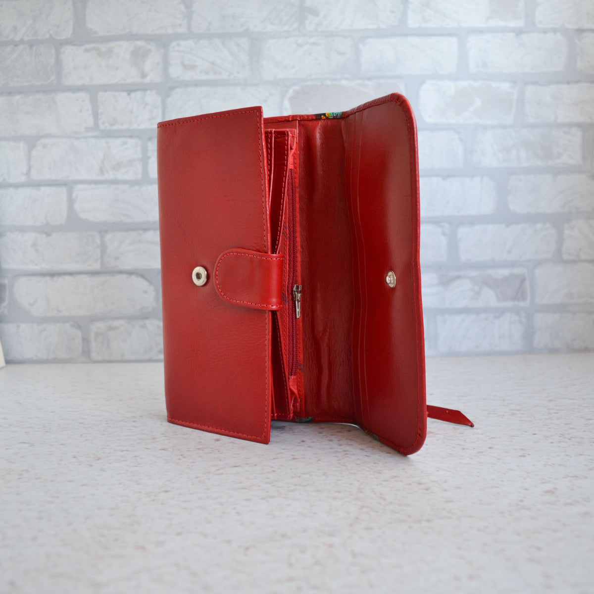 Billetera Flora roja de cuero para mujer